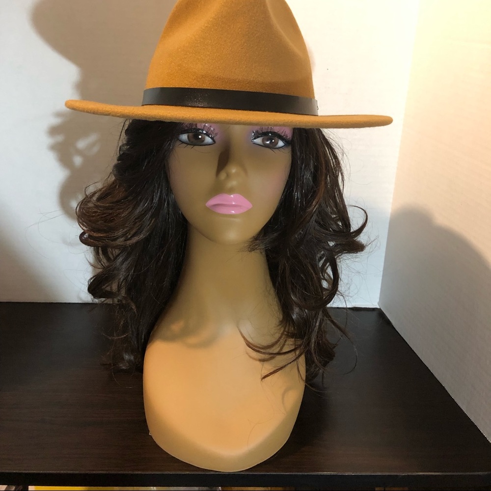 Gently used curly synthetic wig